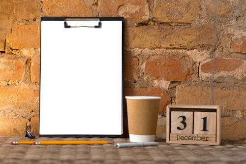 blank-empty-clipboard-brown-brick-wall-with-coffee-cup-pencils-copyspace-31-december-new-years-resolutions.jpg